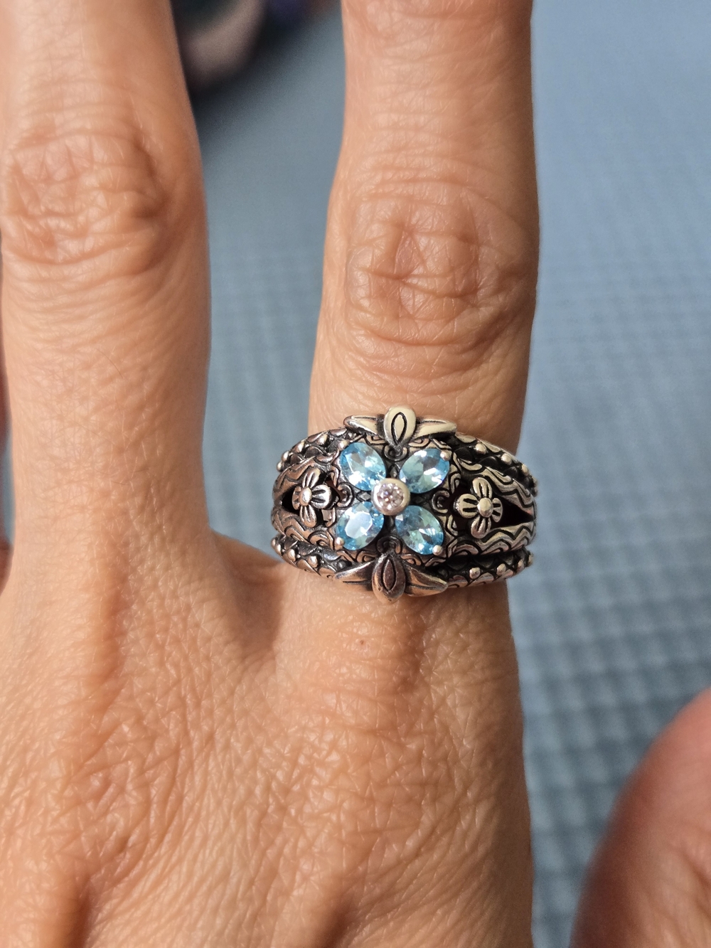 Sterling Silver Blue Topaz Floral Statement Ring